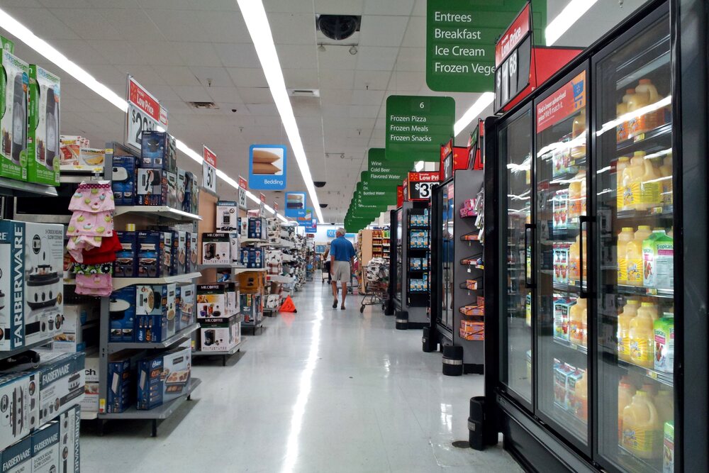 Walmart In-Store Merchandise Aisles with Everyday Low Price and Rollback Signage